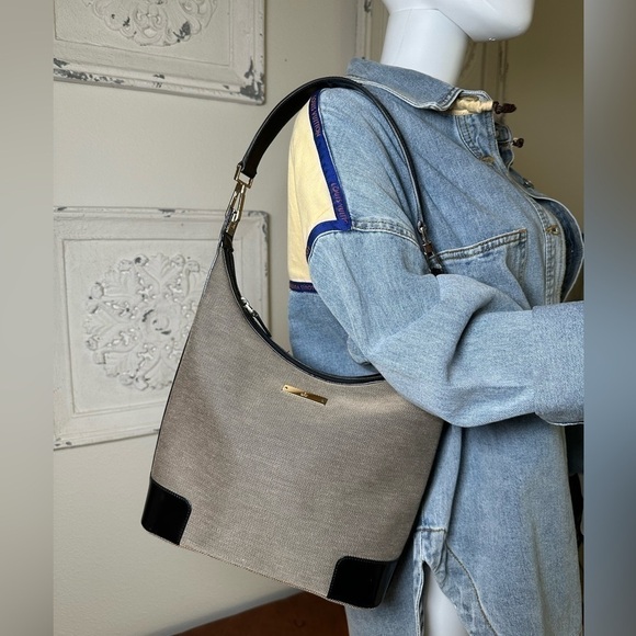 Gucci Handbags - Authentic vintage Gucci Canvas and Black Leather
Hobo Shoulder Bag